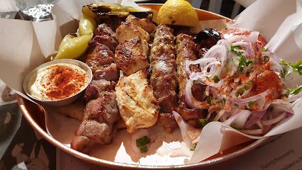 Κυρ Αρίστος (Γύρος στα κάρβουνα με το κιλό)